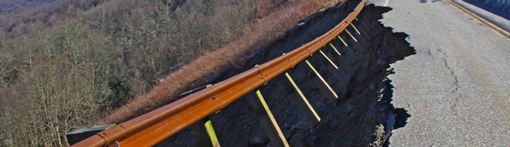 Landslide on the Cherohala Skyway - The guardrail hangs dramatically